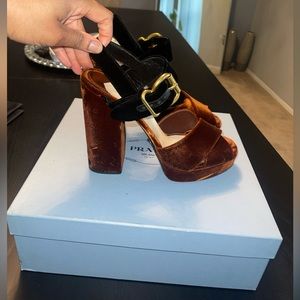 Black and brown Prada pumps